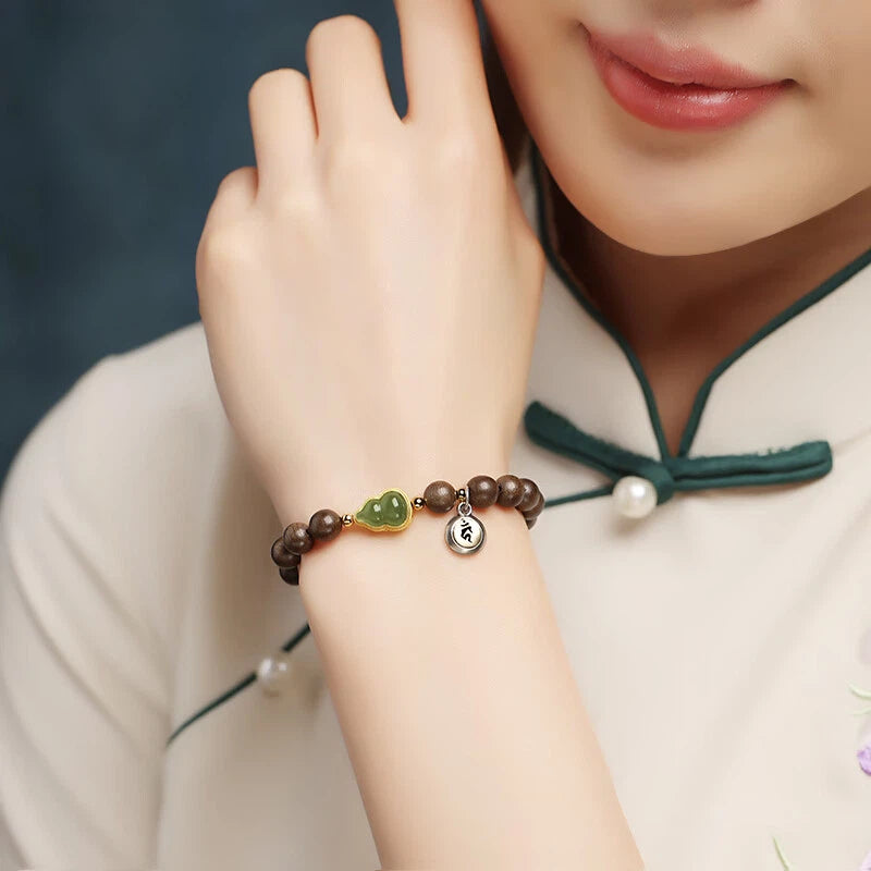 Brunei Agarwood & Hetian Jade Gourd Bracelet – A Fragrance That Lingers, A Guardian That Stays